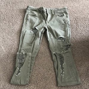 Save green American Eagle distressed skinny jeans. Size 8.